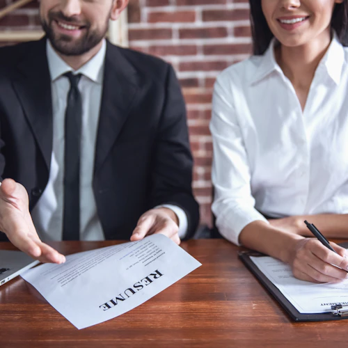 a male and female completing an interview
