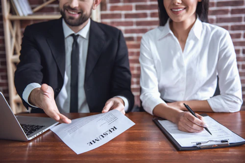 a male and female completing an interview