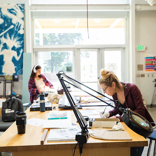 student at a drafting table