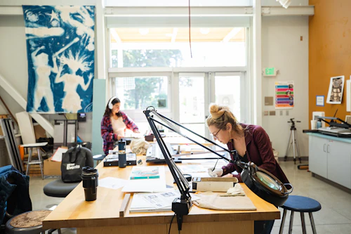 student at a drafting table