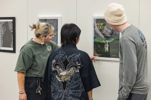 student looking at digital media art