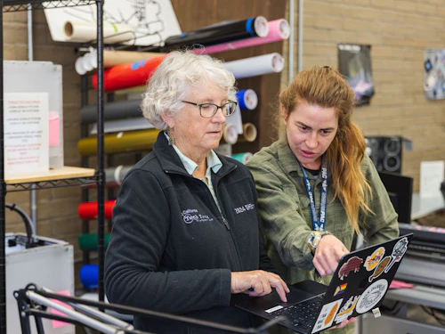 older student getting help with work