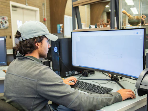 male designing with the computer