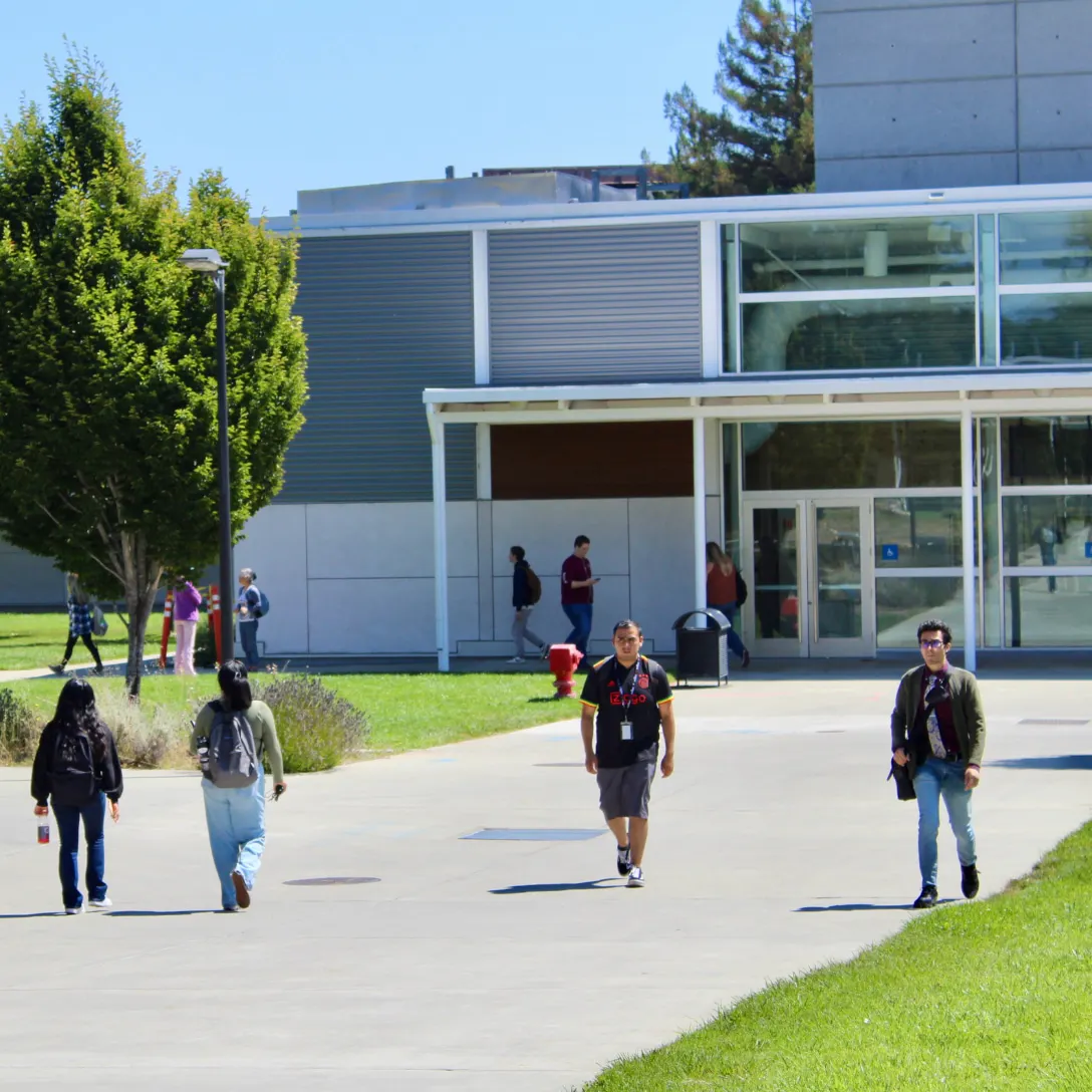 Cabrillo College students walk through the VAPA area of campus