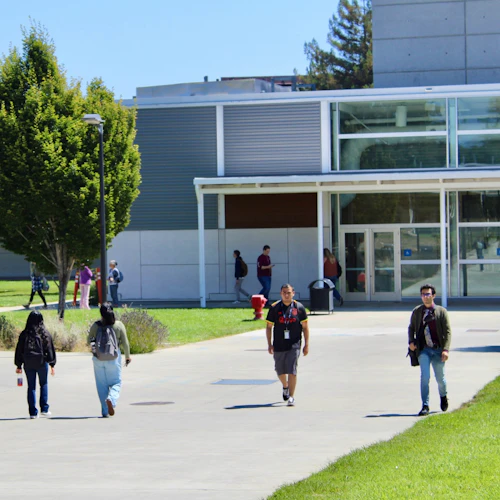 Cabrillo College students walk through the VAPA area of campus